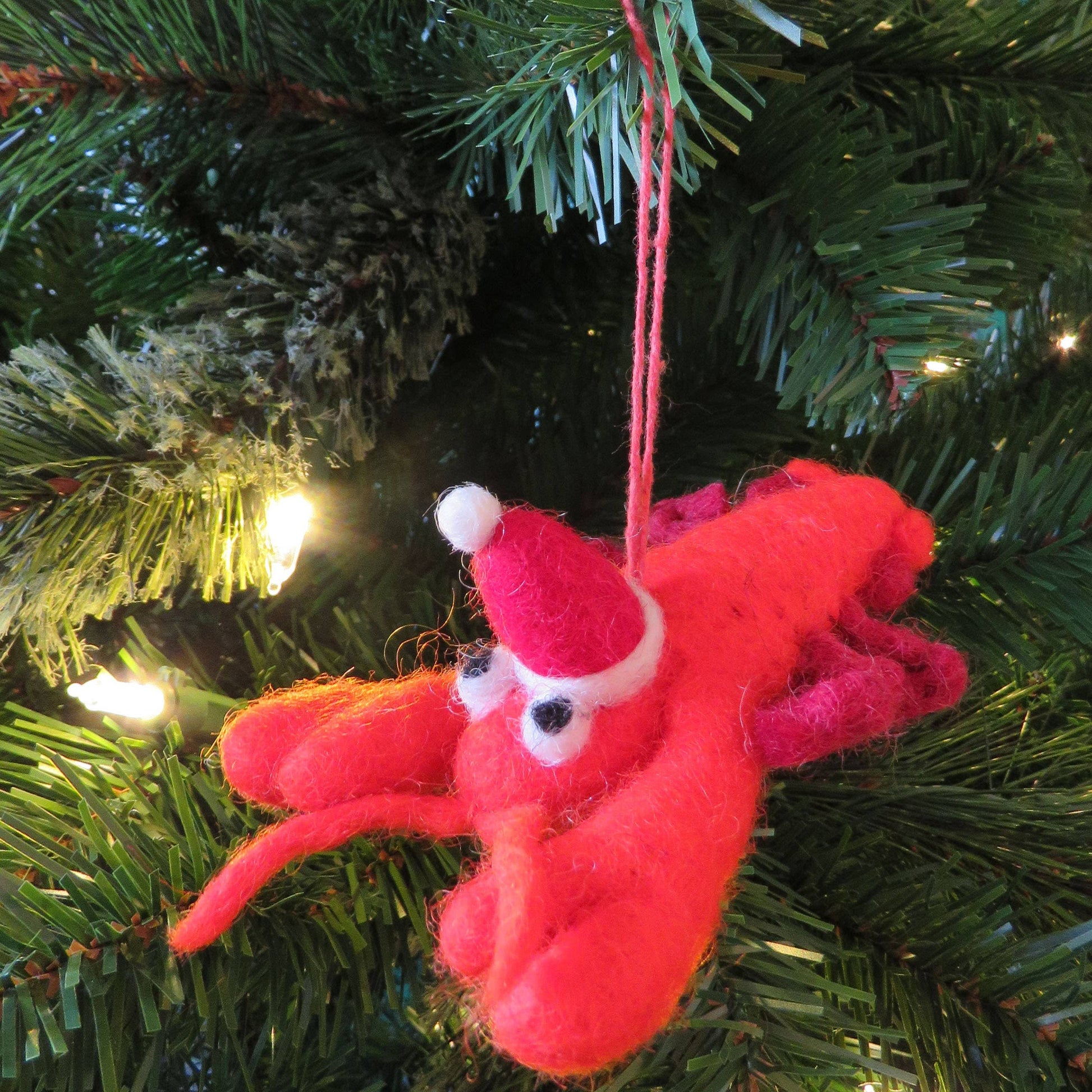 Handmade Felt Festive Lobster Tree Hanging decoration, wearing a red and white Santa hat.