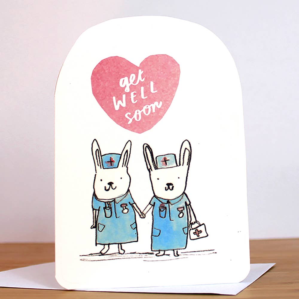 Get Well Soon Bunnies Card. Cute card with illustrated two bunnies dressed in nurses uniforms, ready to care for you.