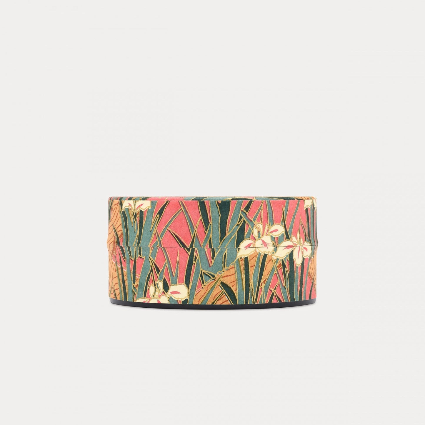 Water Iris / Pink Keepsake Tin– A beautiful floral display of white and pink water iris with contrasting veridian and cobalt green foliage layered over a statement backdrop of carmine pink. Each of our designs are selected from an archive of designs in Kyoto Japan, where we work with family-run silk screen print studios to produce our covering papers. This paper features a gold accent screen, that gives it that truly opulent finish.