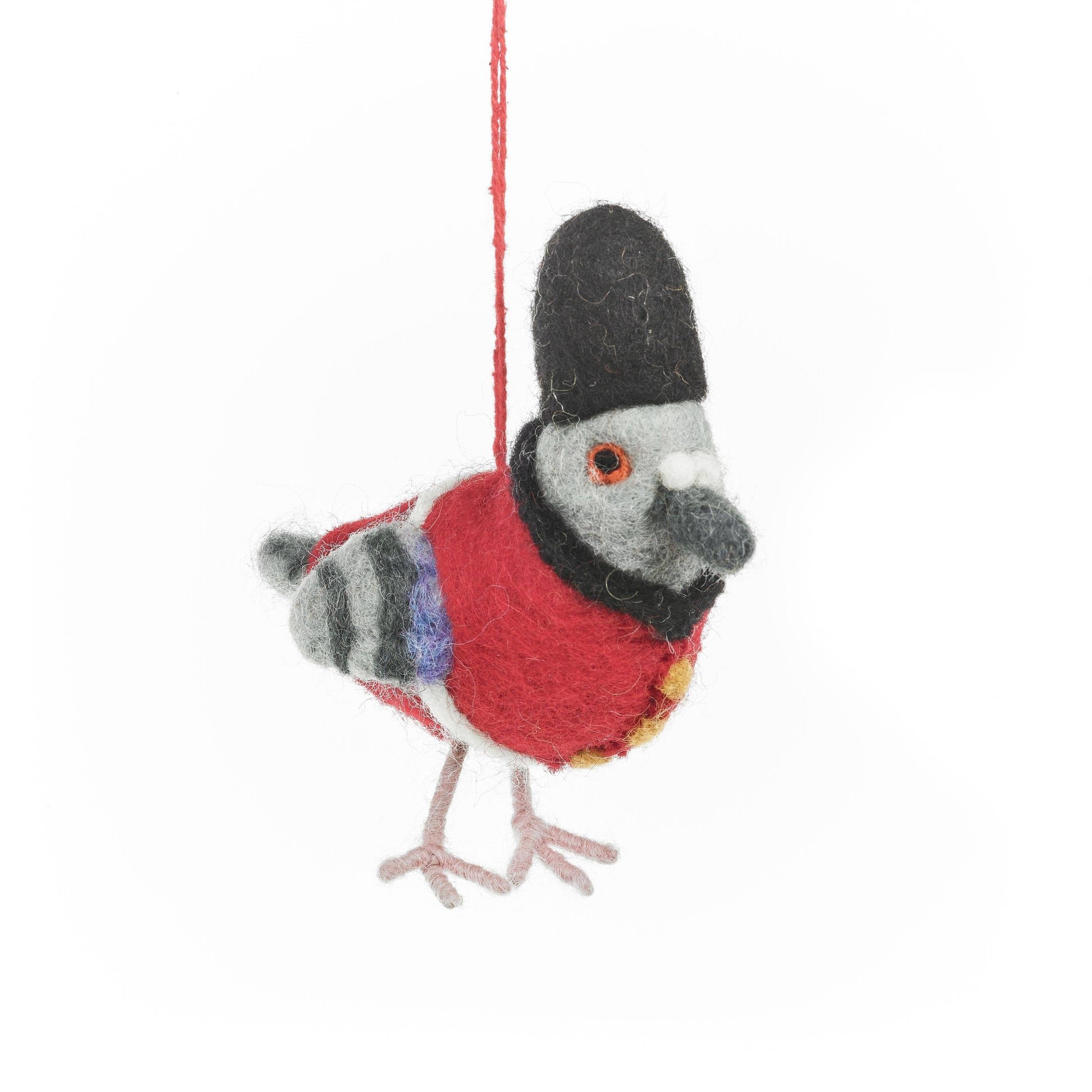 Handmade felt decoration of a pigeon in a London Beefeater red coat and hat. Sustainably and fair trade made in Nepal.