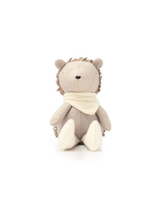 Poppet The Baby Hedgehog teddy. Wearing a cream bib. Adult pocket size.