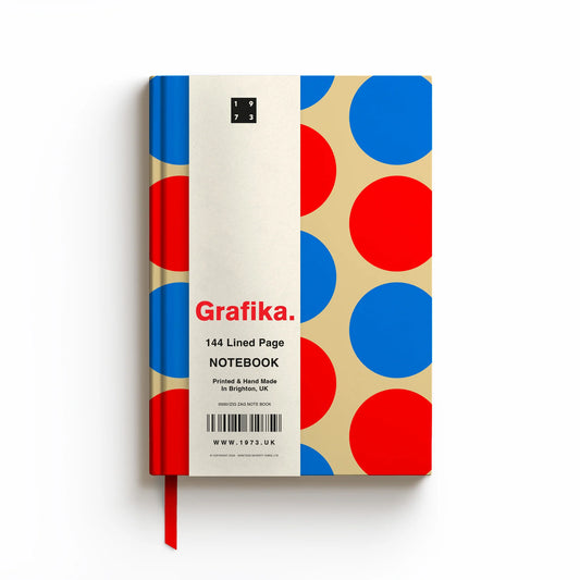 Grafika Hard Backed A5 Lined Notebook. Red and Blue circles against a cream background. With a red ribbon bookmark.