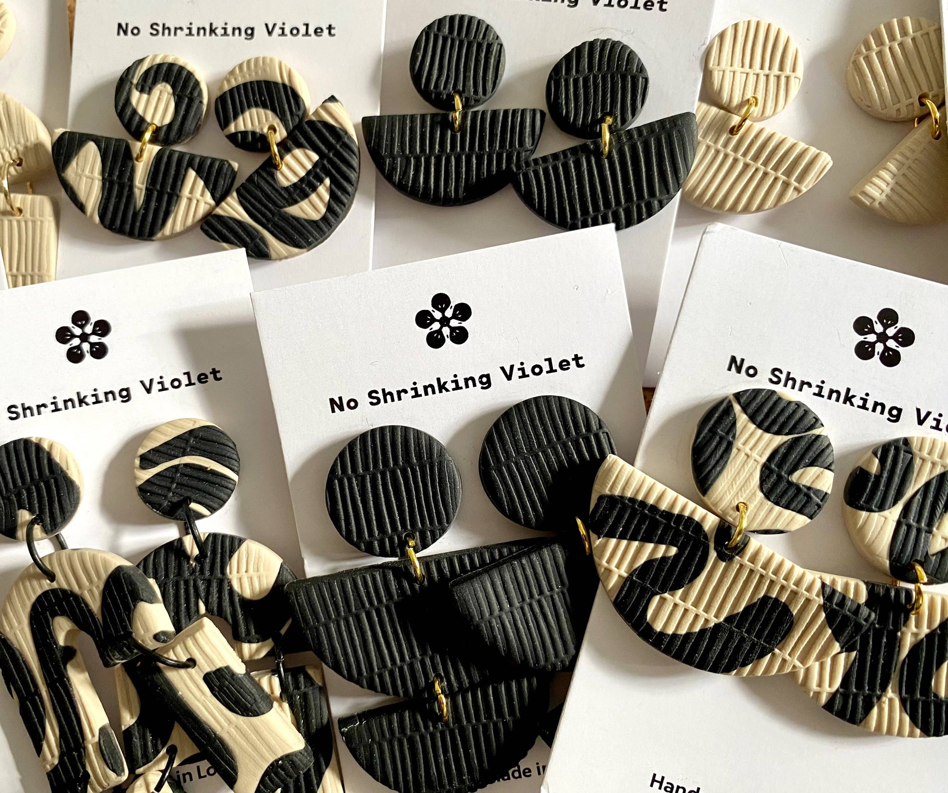 Selection of No Shrinking Violet's Monochrome basket collection earrings.