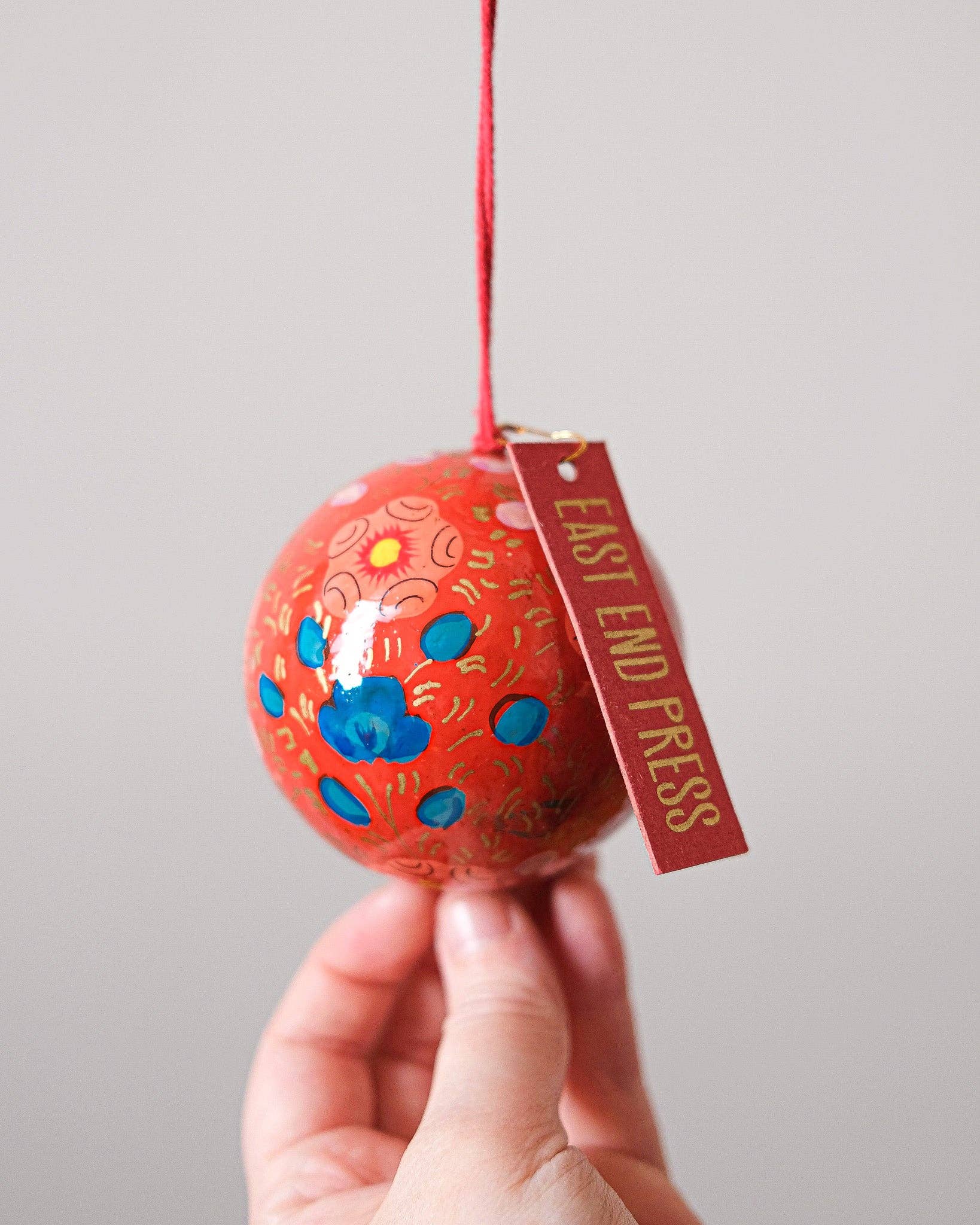 Scarlet Red and Blue Bauble made from papier Mache.