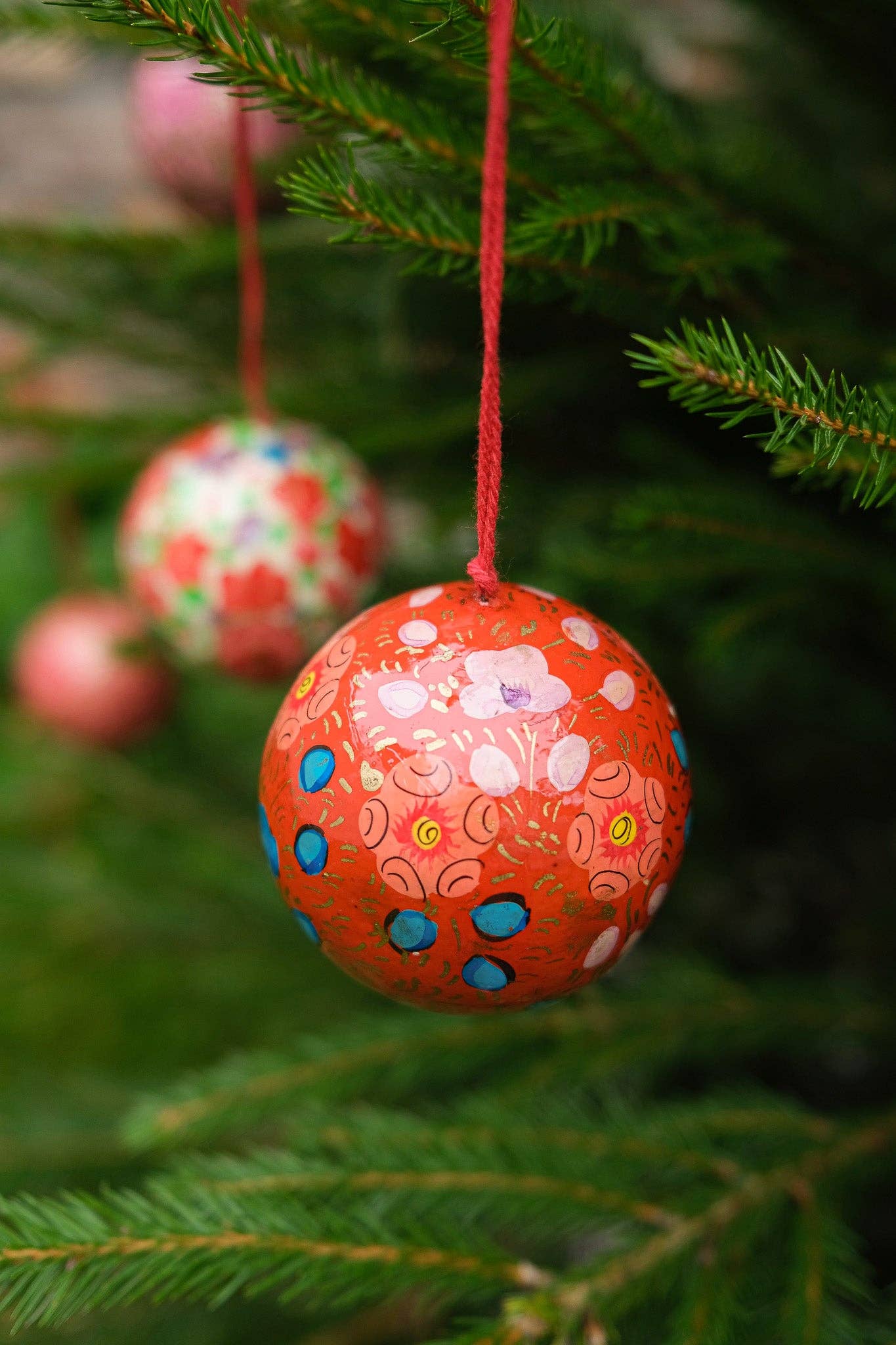 Scarlet Red and Blue Bauble made from papier Mache.