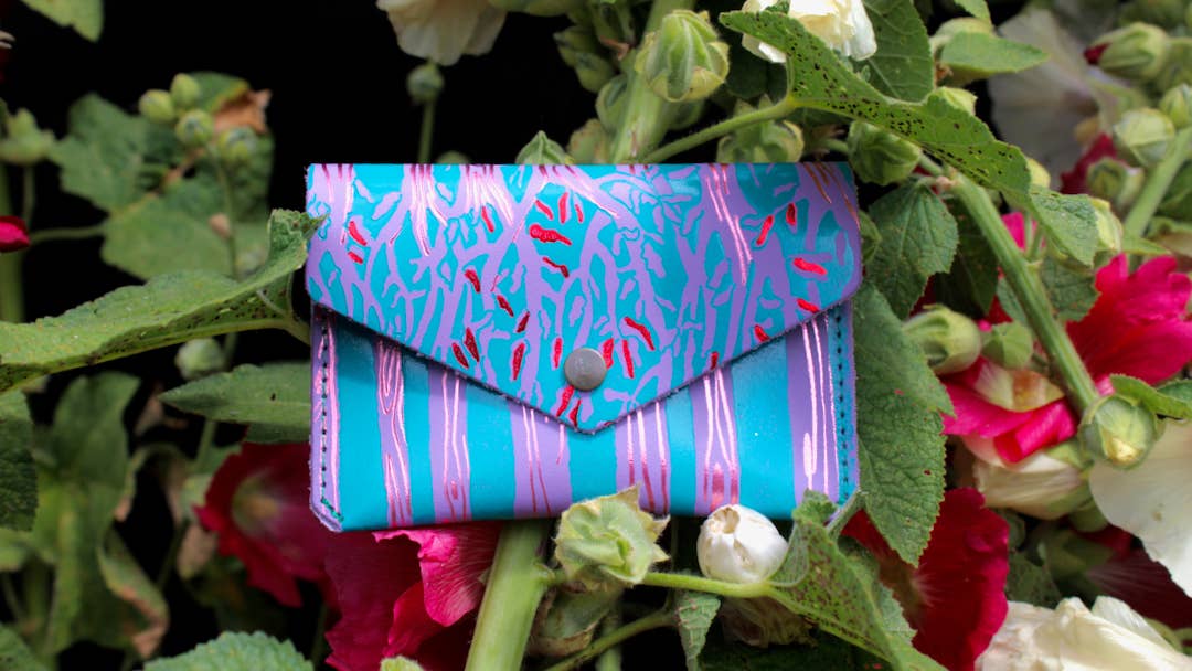 Introducing the newest addition to the Ark Colour Design collection - the Forest Popper Purse! Designed in our Cambridge studio and crafted in Scotland, they have created a striking embossed tree design which is designed to be practical and joyful. Individually hand embossed with both shiny and matte foil.