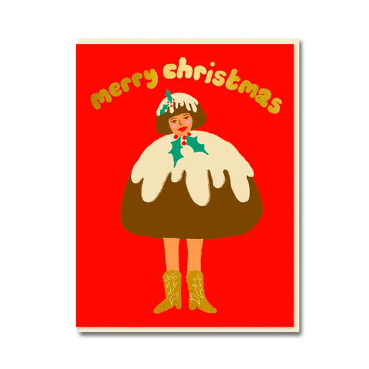 Delightfully humorous card showcasing a lady in Christmas pudding attire, rocking flashy gold cowboy boots. Against a red background with the words Merry Christmas across the top in gold.