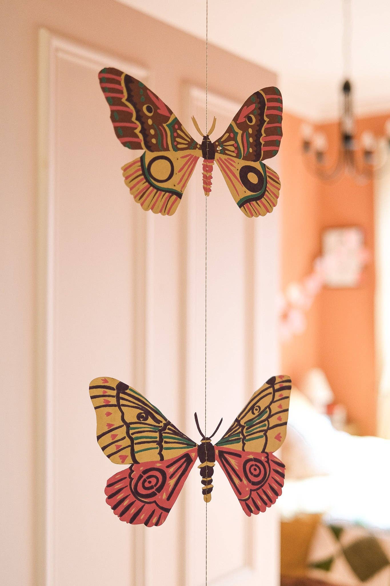 East End Press Delicate butterflies with fluttering wings bring colour and joy to your home in this two-metre-long wall hanging.

2 metres long Butterfly paper shapes are sewn along a strong cotton thread Screen printed by hand on both sides by talented artisans in Jaipur Sustainably made from recycled materials