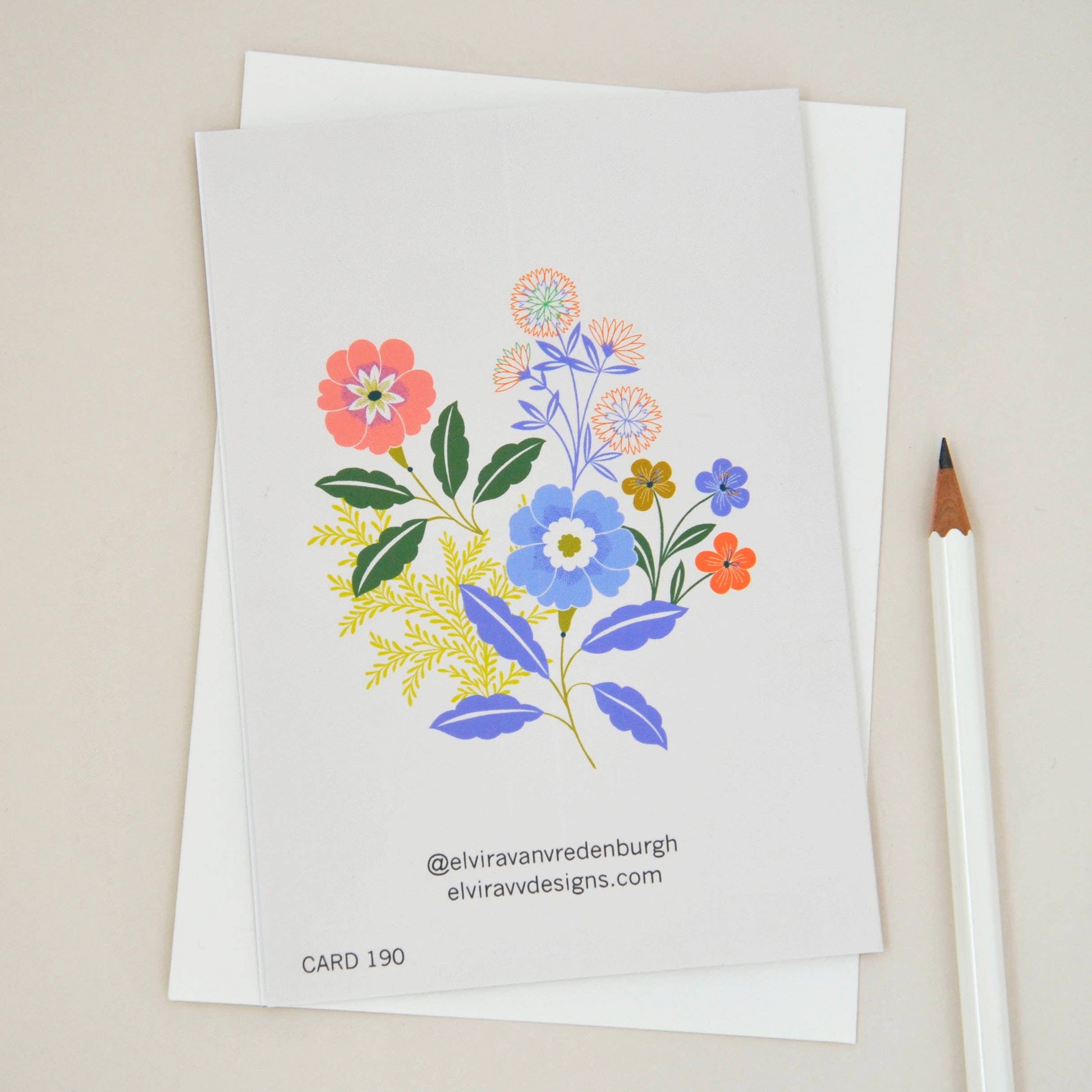 Sending Love Floral Sympathy Greetings Card. Featuring the words Sending Love, and colourful illustrated flowers against a white background.