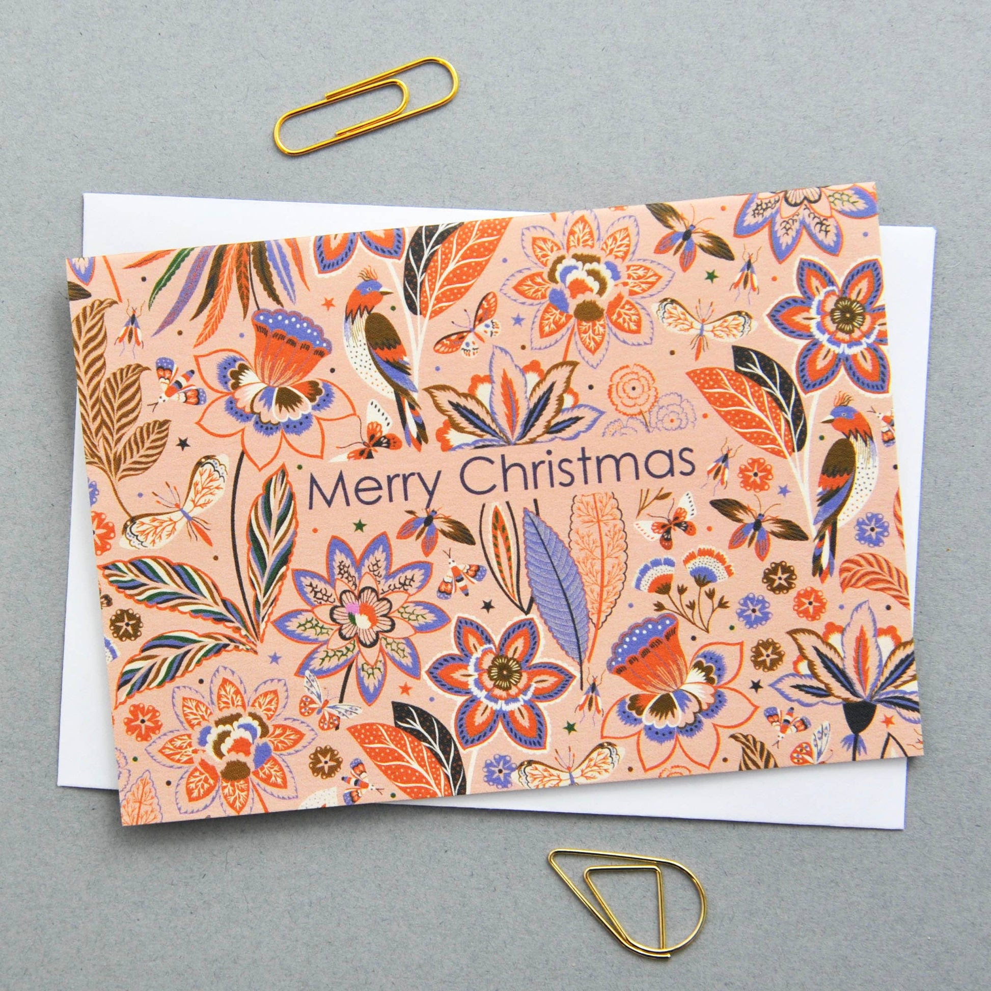 Christmas Holiday Festive Season Notecards. Can be used as small Christmas festive notecards and attached to gifts for the holiday season. Illustrated featuring colourful flora and fauna against a neutral background with the words Merry Christmas.