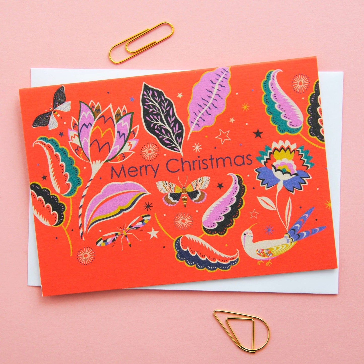 Christmas Holiday Festive Season Notecards. Can be used as small Christmas festive notecards and attached to gifts for the holiday season. Illustrated featuring colourful flora and fauna against a red background with the words Merry Christmas.