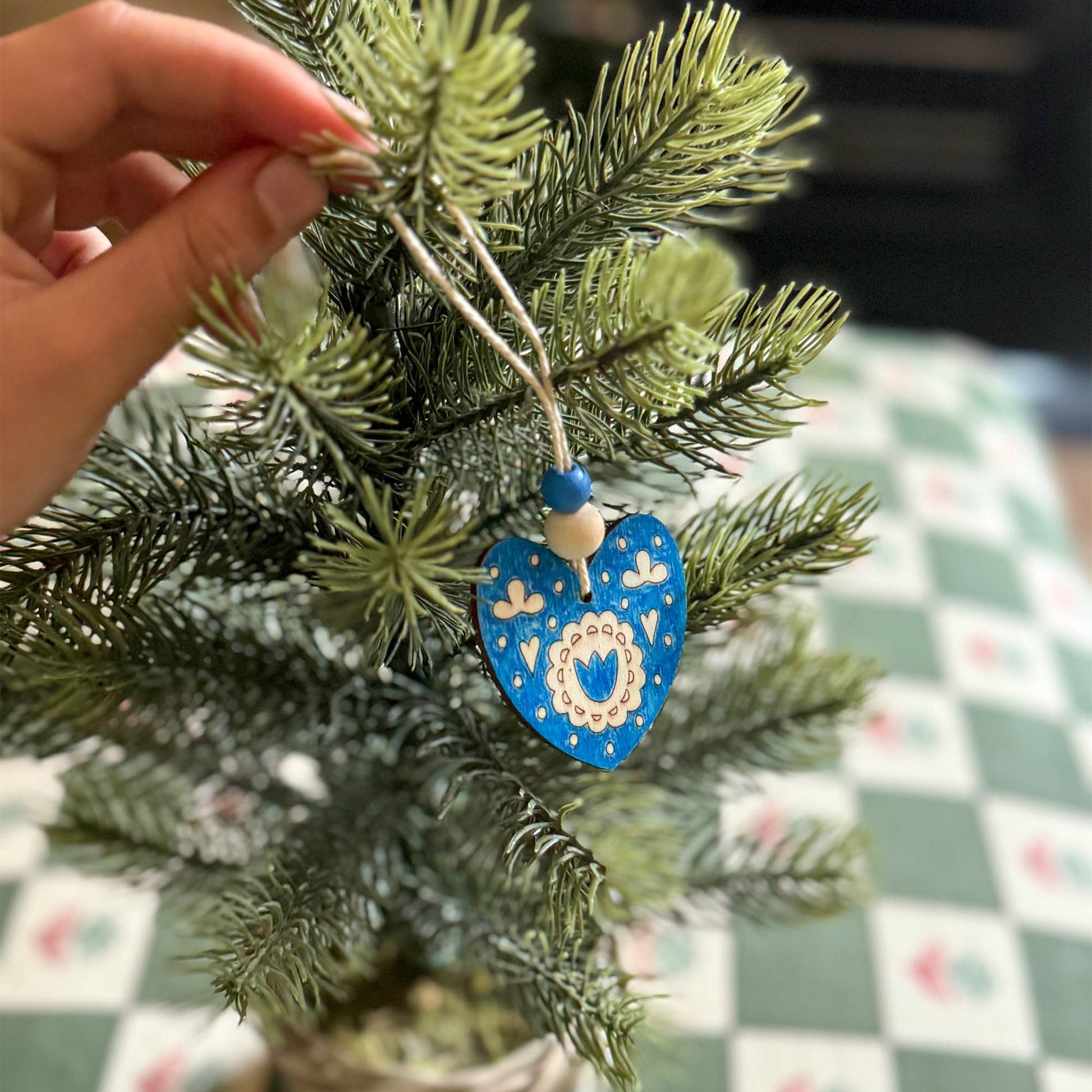 Folk Heart hanging on a Christmas tree