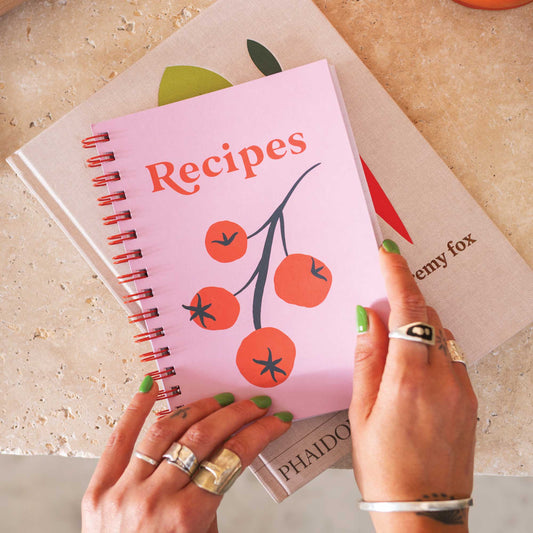 This wire-o bound, blank recipe journal are made up of 128 pages which include handy cooking conversions, index pages, 52 double spread recipe pages, and note pages at the back. With space to add up to 52 recipes. It’s deliciously colourful throughout with a fun, illustrated vine tomato cover.