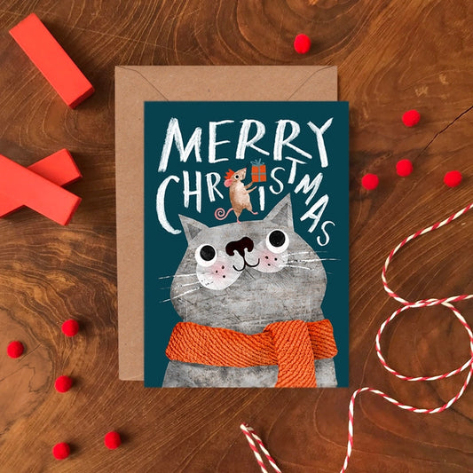 Cat & Mouse Christmas Greeting Card. The card reads Merry Christmas. Illustrated friendly cat in a red scarf, receiving a present from a festive mouse. Best of friends.