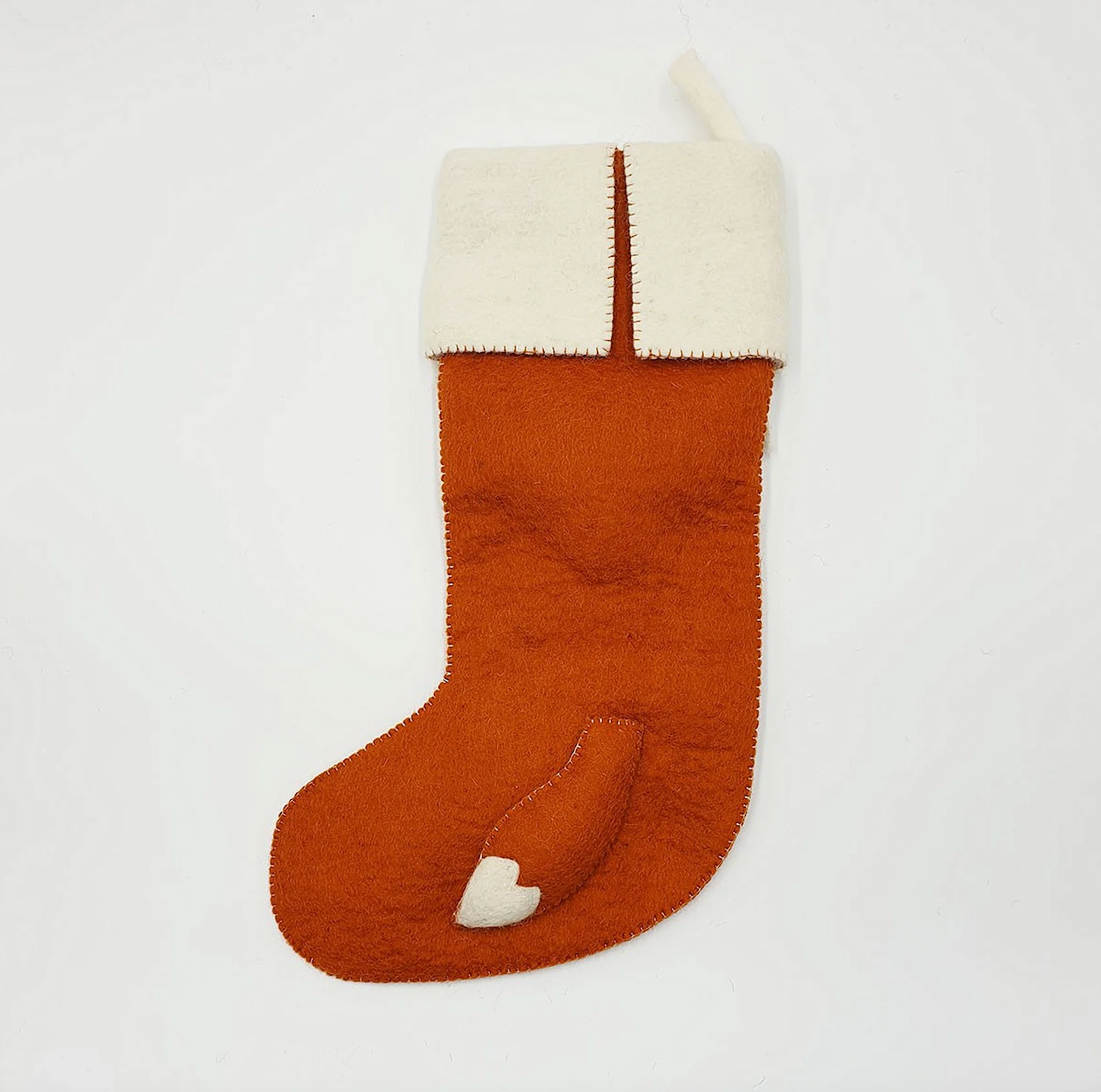 The ever popular Finlay Fox is ready for the festive season! This adorable Christmas stocking with three-dimensional ears and tail. Made from organic felt wool.