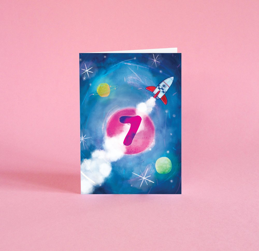 Illustrated 7th birthday card, featuring space rockets, planets and a galaxy of stars.

Greetings card blank inside, card made of FSC approved paper, Callisto Diamond White - 350gsm. Envelope made from 100% recycled paper

Greetings card size A6 when folded,

Printed in the UK

Wrapped in biodegradable sleeve.