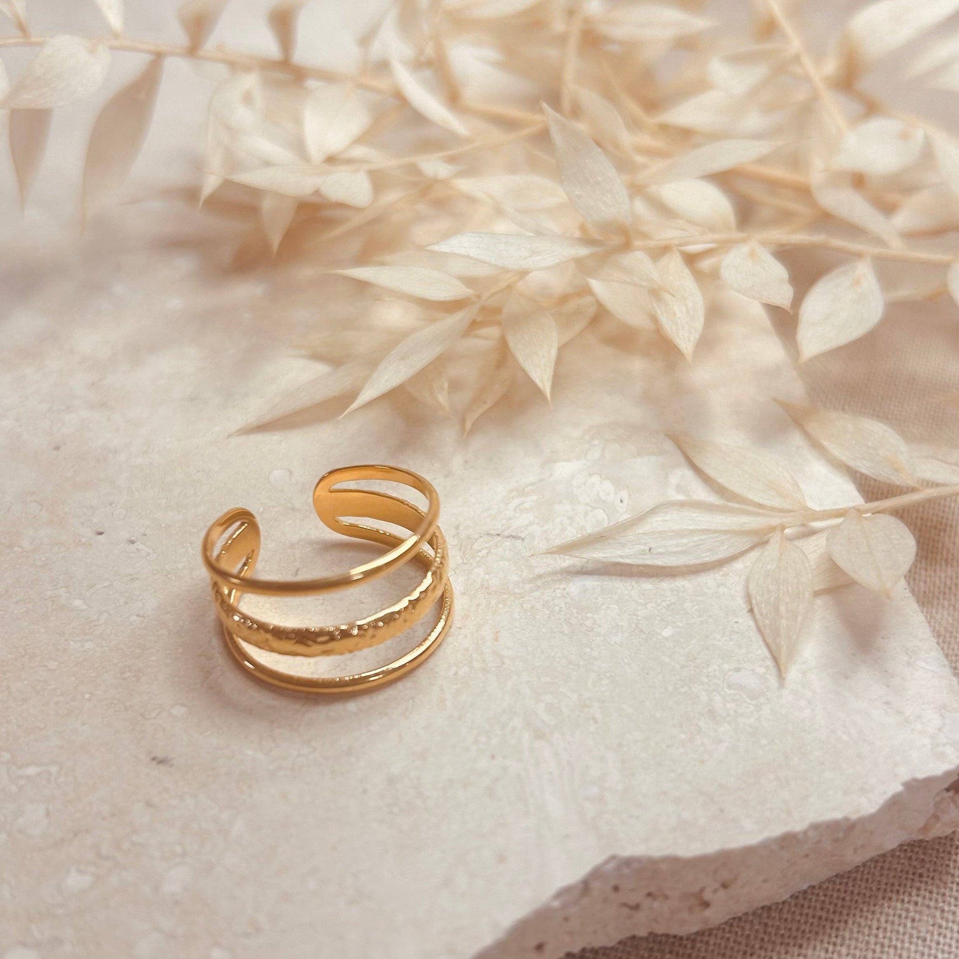 Adjustable gold ring with hammered detail. 18k gold plated ring, delicate and comfortable enough for day wear, but will perfectly take you through to the evening too.