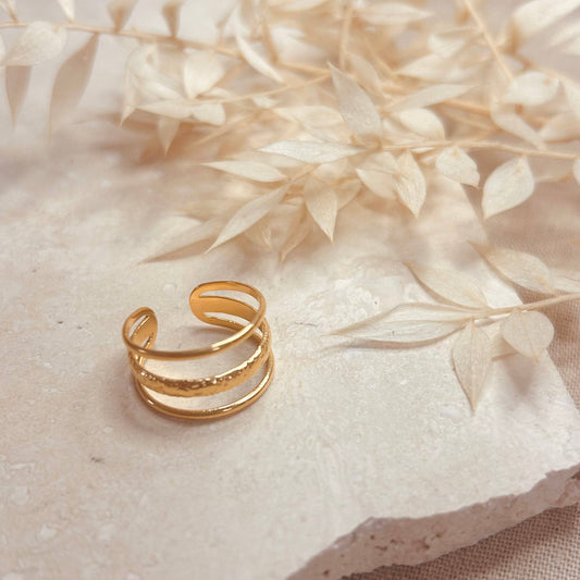 Adjustable gold ring with hammered detail. 18k gold plated ring, delicate and comfortable enough for day wear, but will perfectly take you through to the evening too.