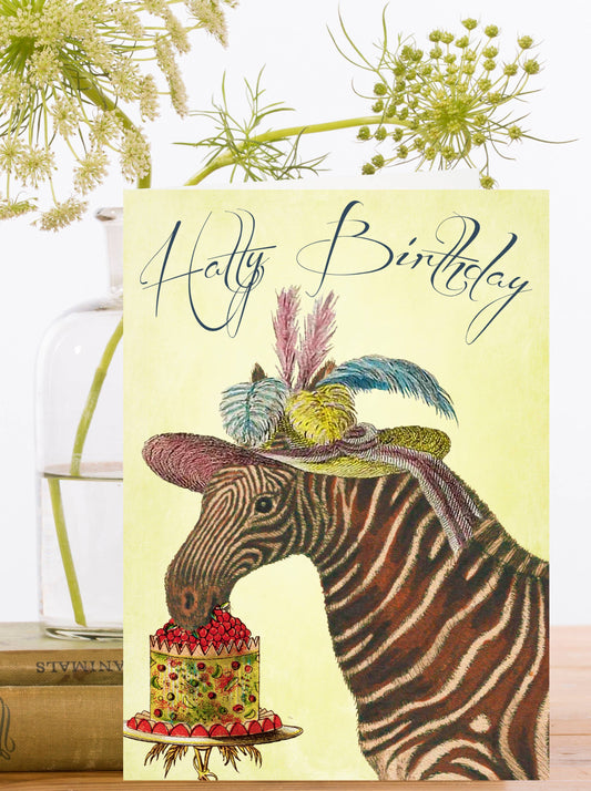 Fun vintage card, featuring the chicest of zebra's in a feathery party hat. Living their best life eating birthday cake.