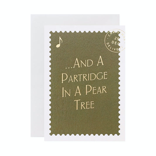 '...And A Partridge' Stamp Inspired Christmas Card. Inspired by Festive Postage Stamps, Another Loop's Christmas card collection pays homage to the age-old tradition of sending warm wishes through letters and postcards during the holiday season. Olive Green jewel tones, mottled gold foil and retro typography all encapsulate the magic of communication and connection. A7 with a light grey envelope.