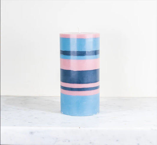 An eco, fair trade pillar candle, hand poured in bold stripes of British Colour Standard Rose Pink, Indigo Blue and Pompadour.

Size: 15cm tall x 7.5cm wide.
Eco and vegan candle wax.