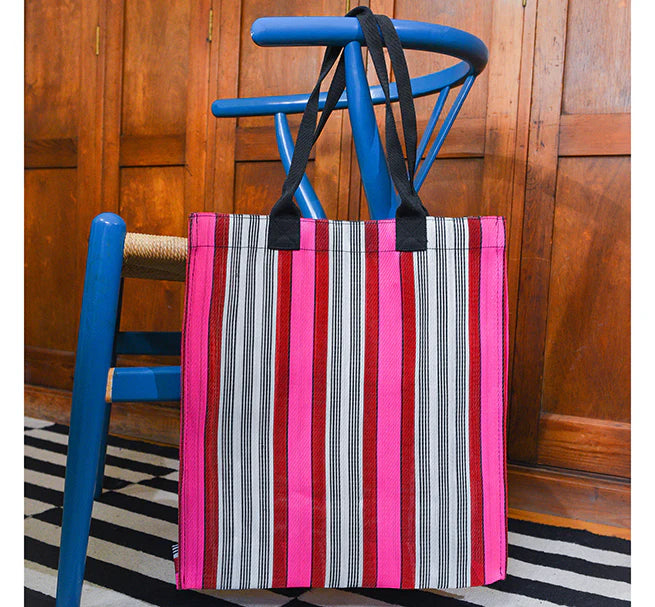 Eco Woven Market Shopper in Neyron, Guardsman and Pearl. A colourful, sustainable shopper with sturdy handles and a magnetic popper closure. This bag is made from threads spun from recycling old cement sacks!