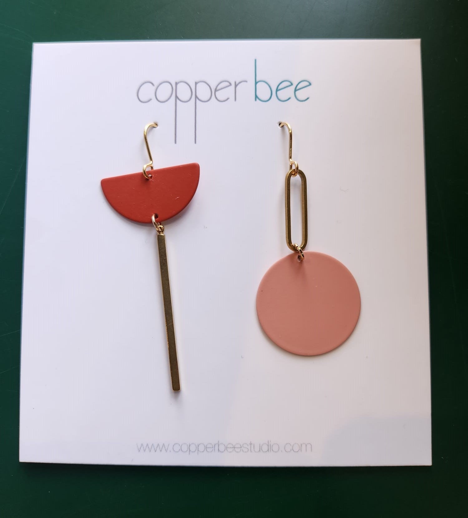 Statement Mismatch Copper Bee Earrings. Handmade in the UK. One earring is Rust Orange  and one is Dusty Pink with Brass.