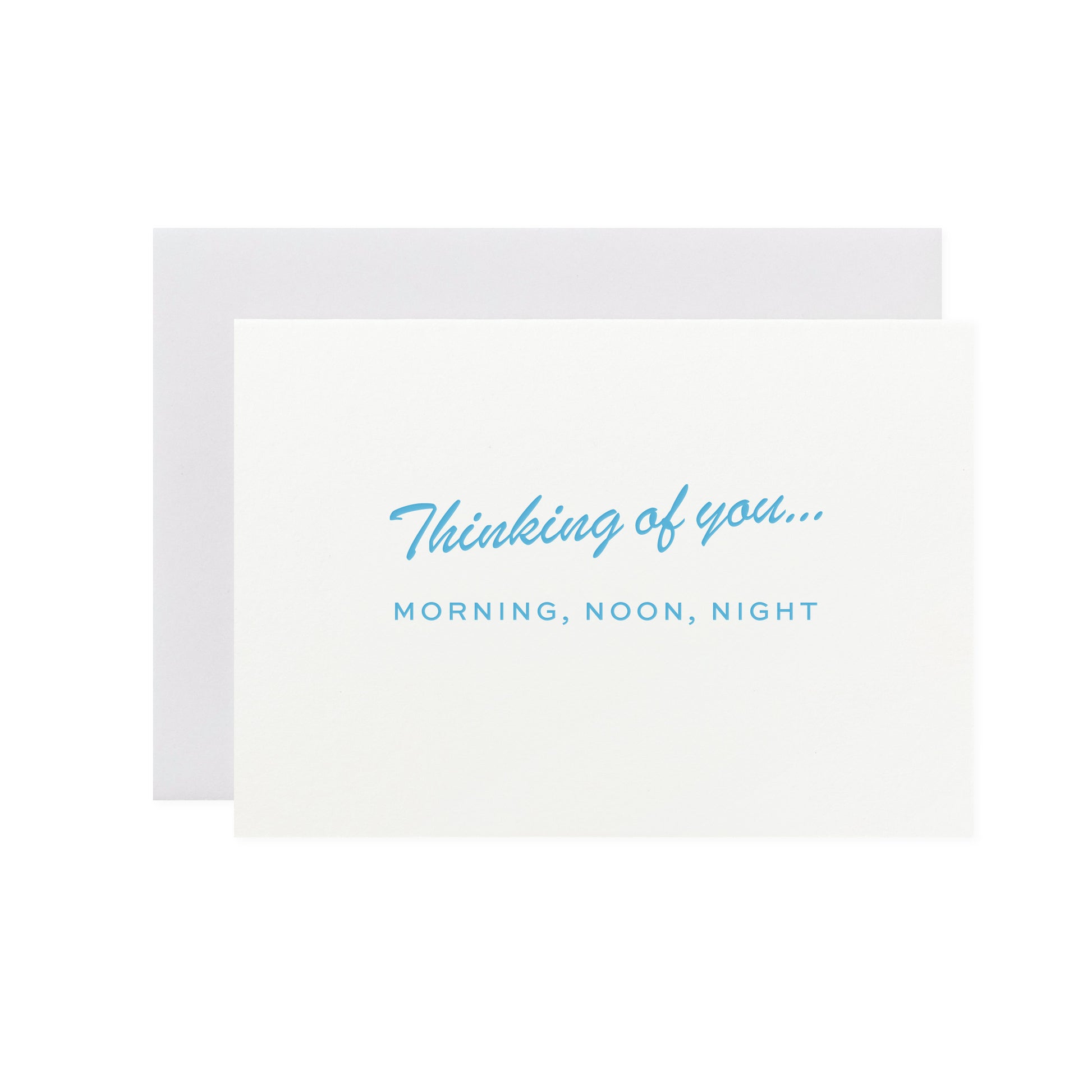 Mini white card. With the words Thinking of you...MORNING, NOON, NIGHT in blue letters. Hot foil pressed by hand in Another Loop's small studio with card stock made from recycled coffee cups, this extra special greetings card will help you stay connected in a sustainable way.