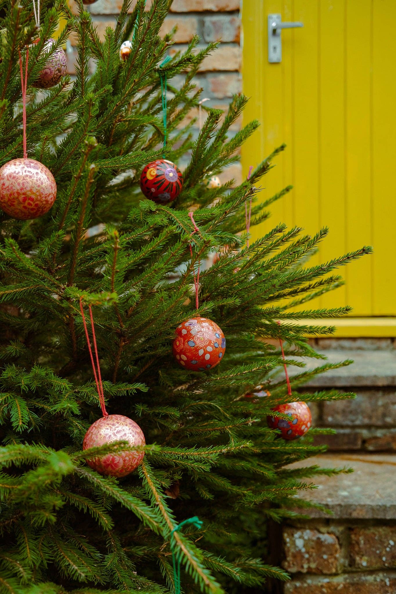 Scarlet Red and Blue Bauble made from papier Mache.