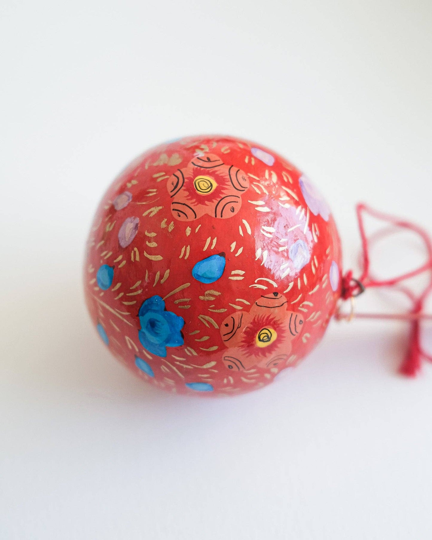 Scarlet Red and Blue Bauble made from papier Mache.