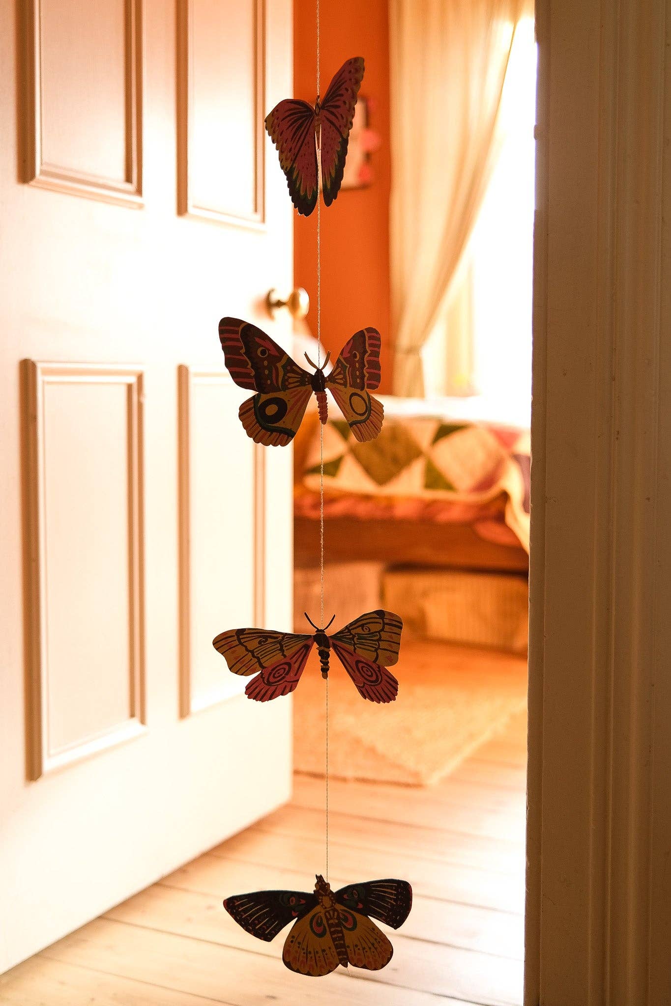 East End Press Delicate butterflies with fluttering wings bring colour and joy to your home in this two-metre-long wall hanging.

2 metres long Butterfly paper shapes are sewn along a strong cotton thread Screen printed by hand on both sides by talented artisans in Jaipur Sustainably made from recycled materials