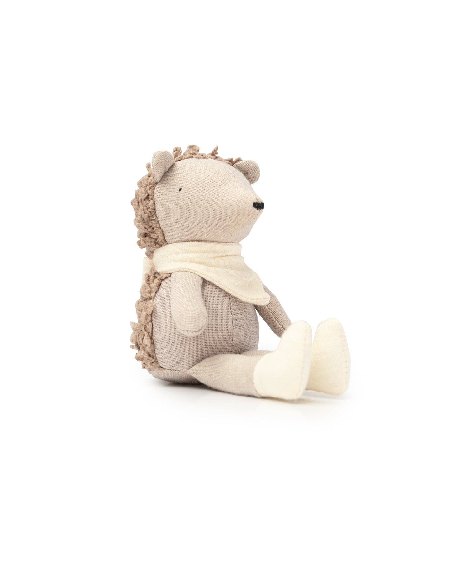 Poppet The Baby Hedgehog teddy. Wearing a cream bib. Adult pocket size.