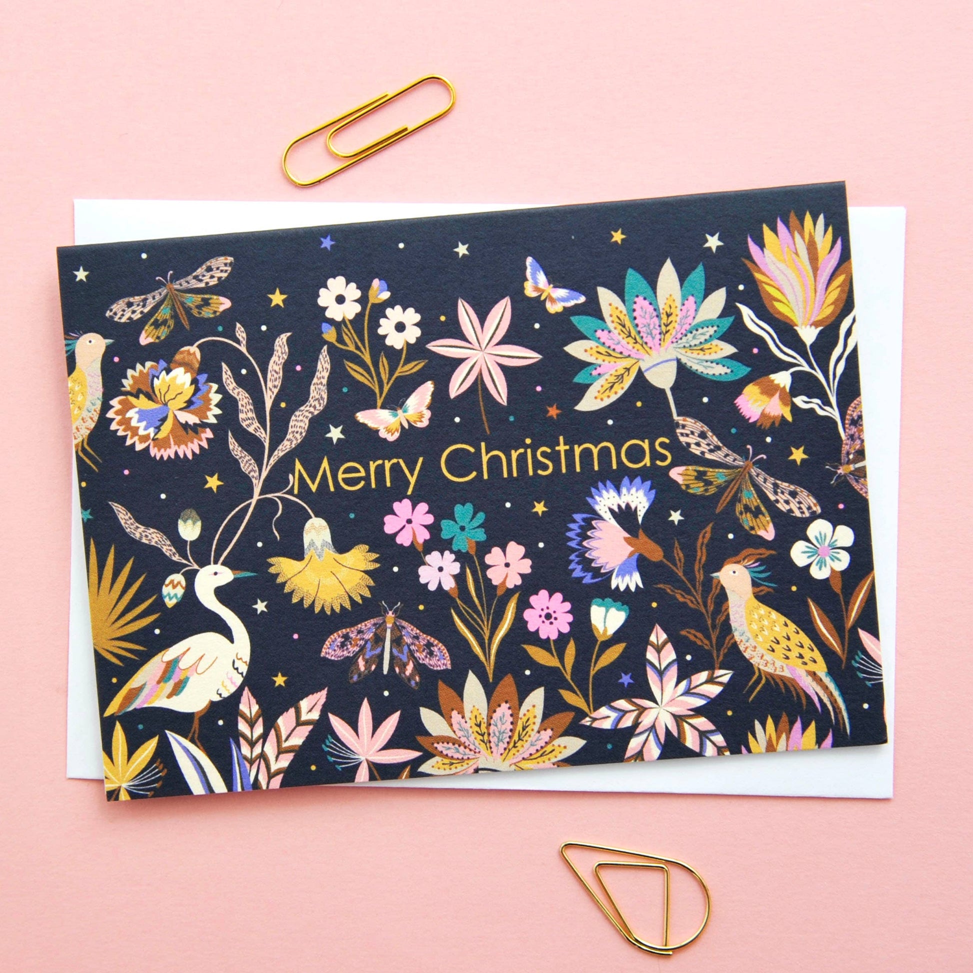 Christmas Holiday Festive Season Notecards. Can be used as small Christmas festive notecards and attached to gifts for the holiday season. Illustrated featuring colourful flora and fauna against a dark background with the words Merry Christmas.