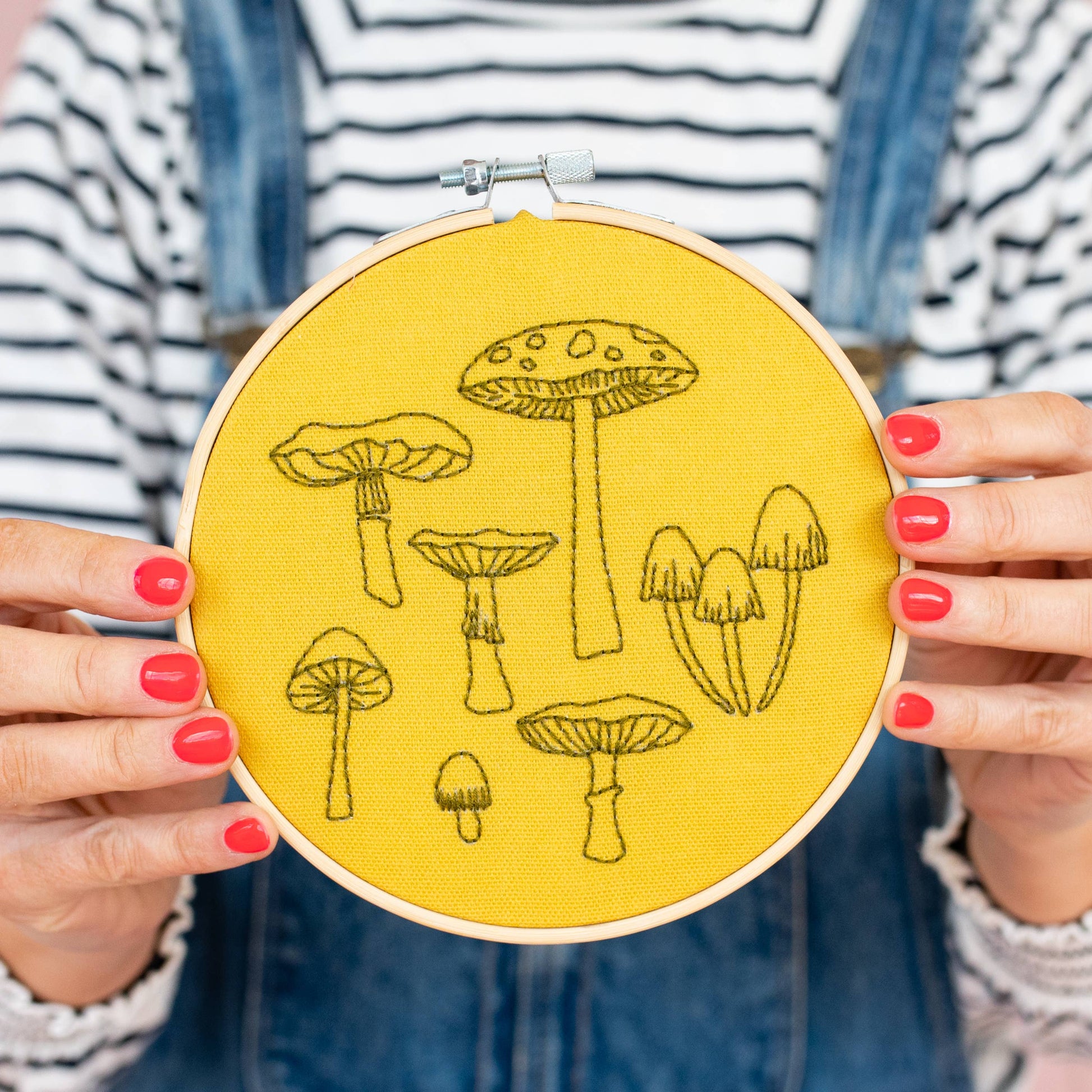 Yellow Fungi Embroidery Hoop Kit Kit by Cotton Clara. Featuring  seven different fungi's in black thread to embroider.