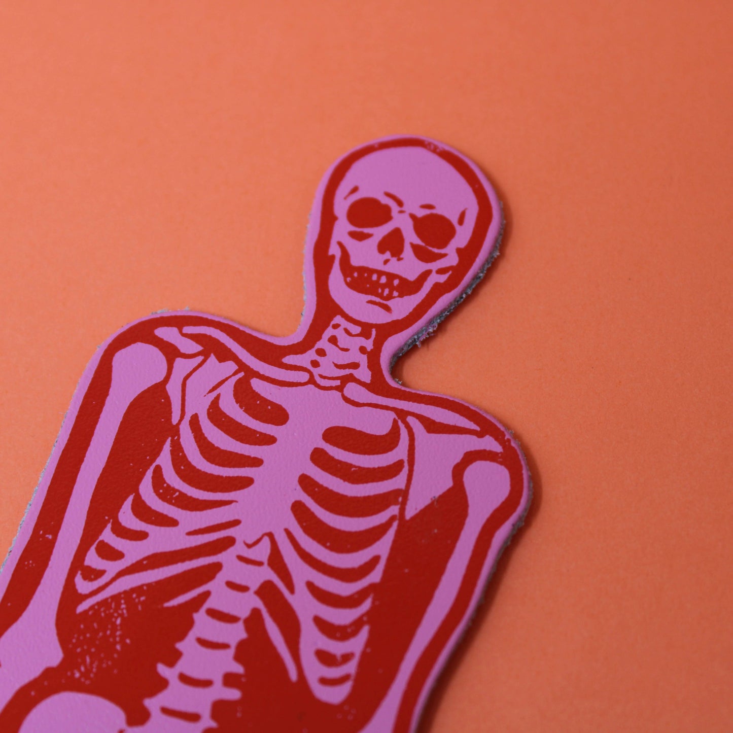 A spooky skeleton leather bookmark embossed with ‘You read right through me’ on the reverse.