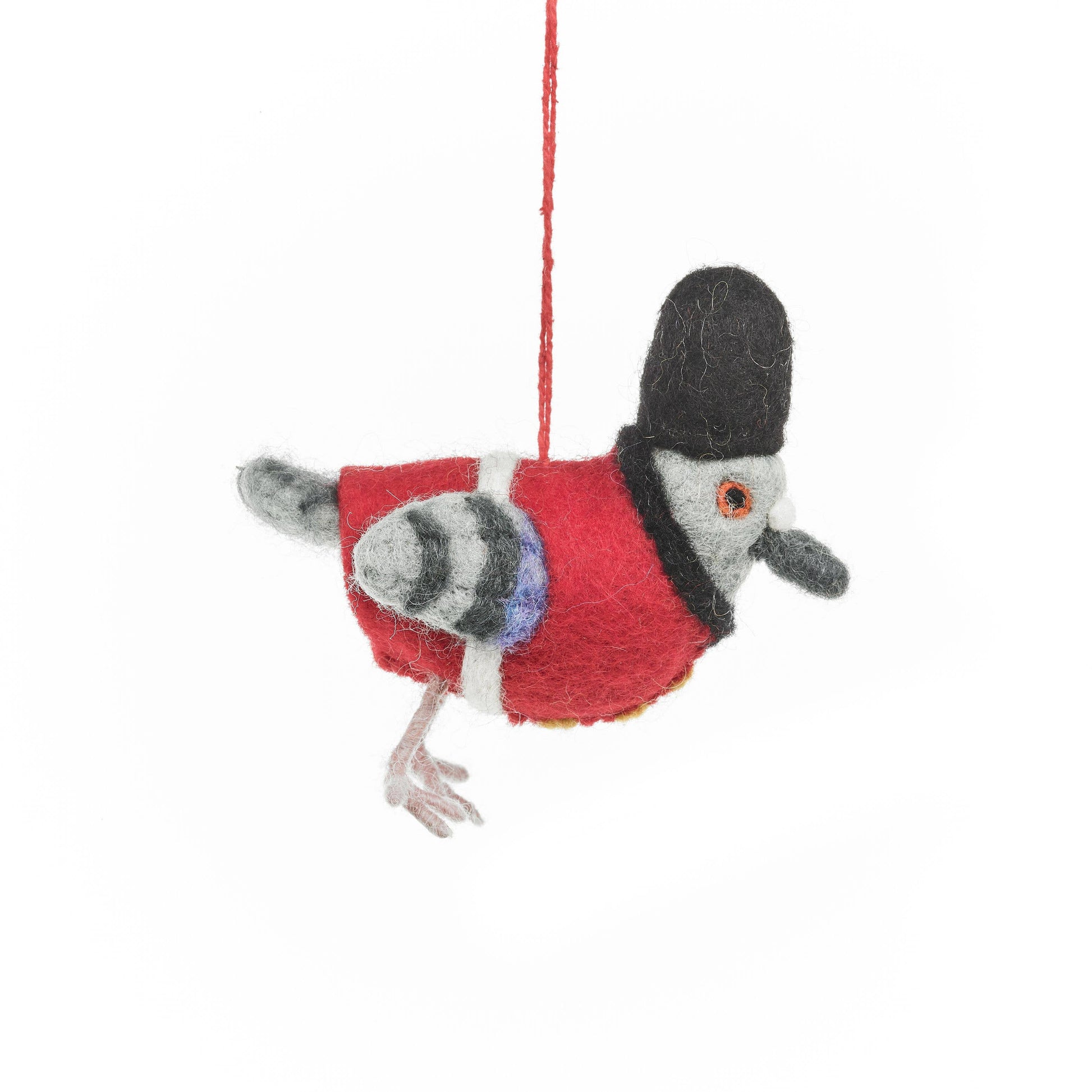 Handmade felt decoration of a pigeon in a London Beefeater red coat and hat. This is a hanging decoration. Sustainably and fair trade made in Nepal.