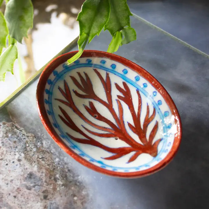 Hand Painted Indian Ceramics - Soap Dish. Red Coral decorated with a blue pattern around the outside of the coral.