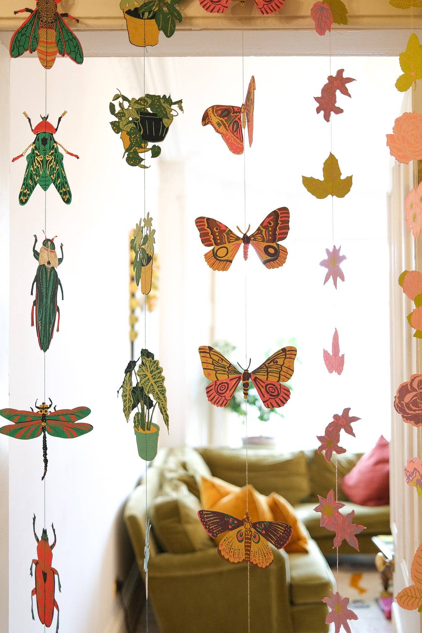 East End Press Delicate butterflies with fluttering wings bring colour and joy to your home in this two-metre-long wall hanging.

2 metres long Butterfly paper shapes are sewn along a strong cotton thread Screen printed by hand on both sides by talented artisans in Jaipur Sustainably made from recycled materials