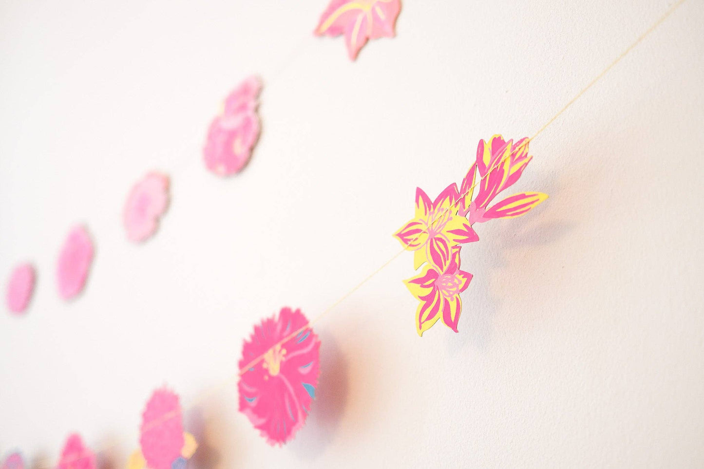 There are twenty bright and beautiful blooms along this three-metre-long garland - perfect for adding some sunshine to your home.

3 metres long * Screen printed by hand on both sides by talented artisans in Jaipur * Sustainably made from recycled materials