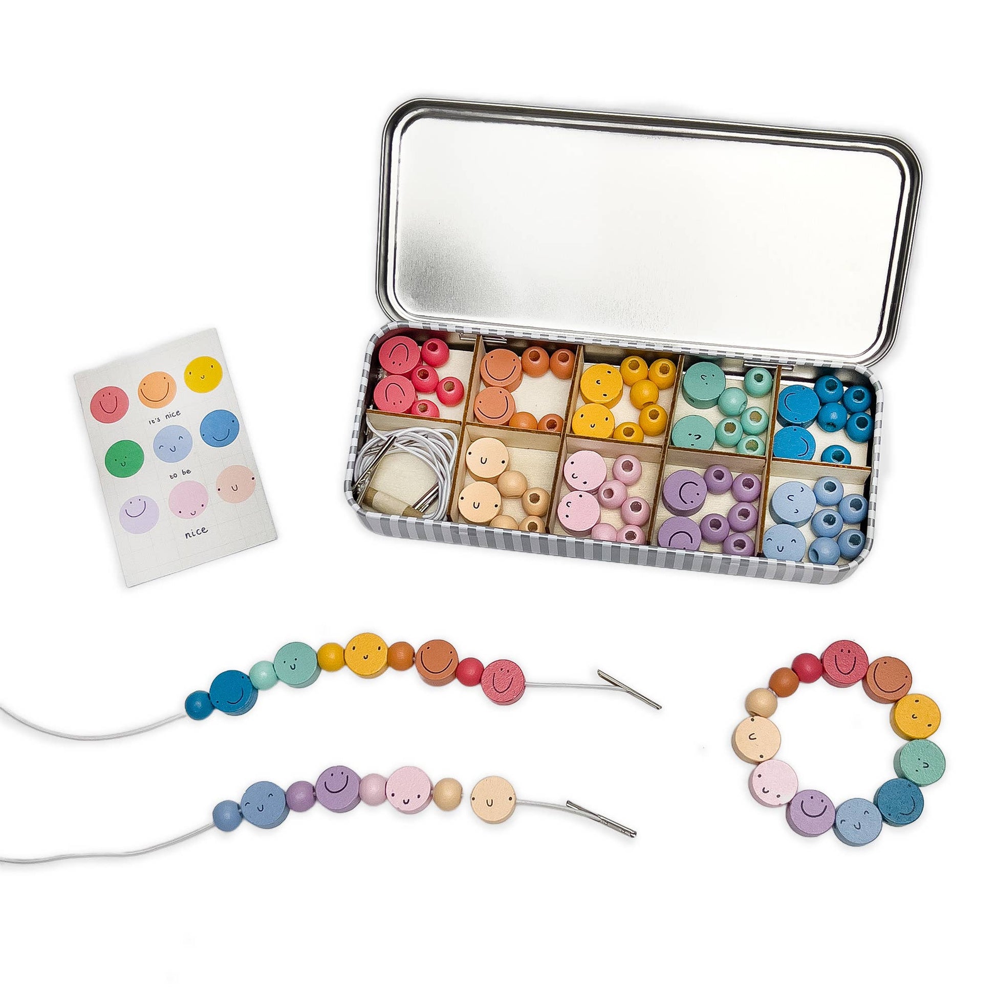 Introducing Cotton Twist's collaborative product: a charming beading set inspired by Abel and the Label's uplifting print, "It's Nice to Be Nice." Crafted with love, this set is more than just a fun activity. We believe that teaching children the value of kindness is essential. Containing enough beads to make 5 beautiful bracelets, a selection of smiley faces and colourful spacer bead await!