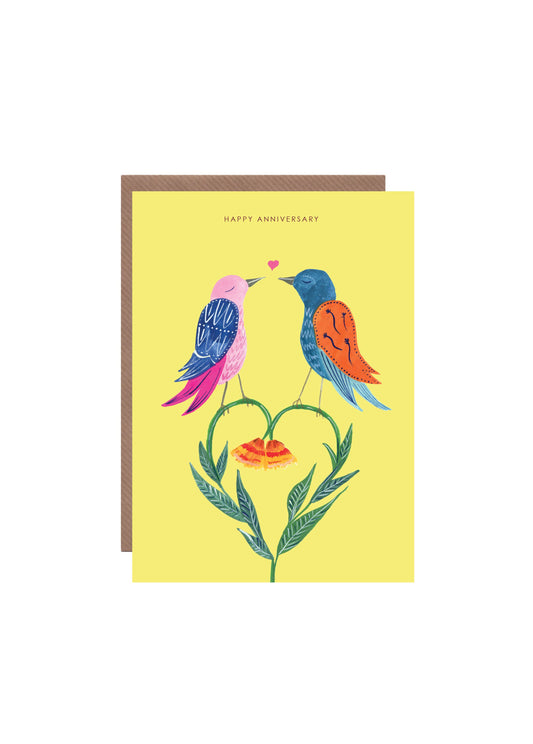 This joyful card features a pair of fanciful love birds alongside the wording 'HAPPY ANNIVERSARY'. A magical way to celebrate a milestone and suitable to send either to a partner or a couple.