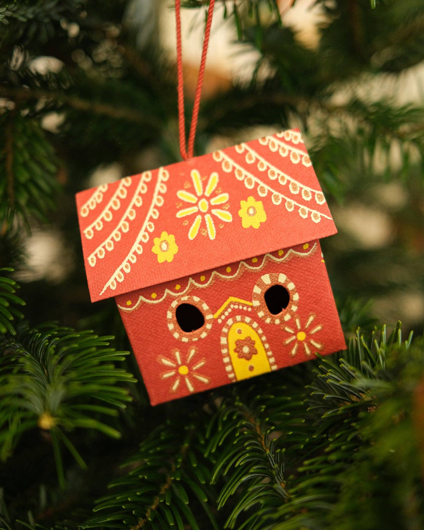 Gingerbread House Screen printed board hanging ornament, sustainably made from 100% recycled paper.