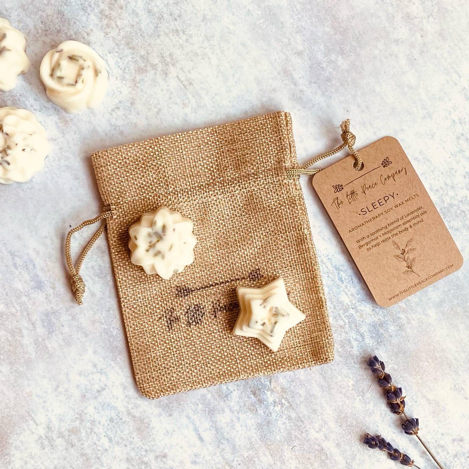 Sleepy Aromatherapy Soy Wax Melts with essential oils with soothing aromas of Lavender, Bergamot + Marjoram essential oils. Finished by hand with dried English Lavender. Five wax melts come in a burlap bag.