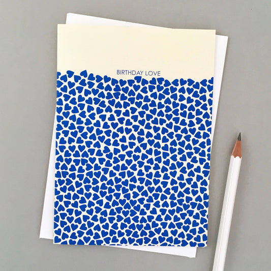 Birthday Love Card. Featuring hundreds of blue hearts scattered against a white background, with the words Birthday Love