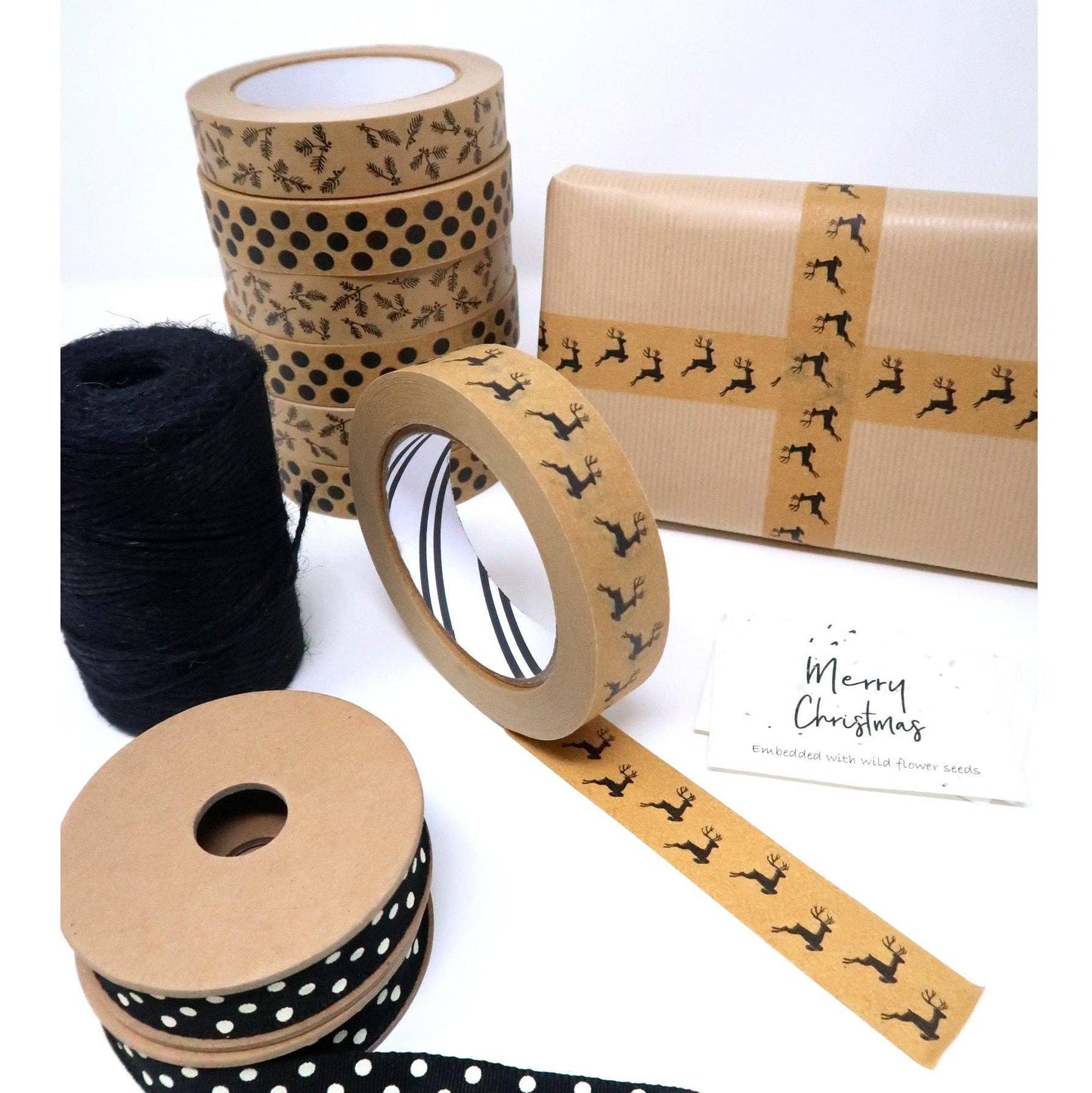 Reindeer Eco Friendly Paper Tape. Brown Kraft paper tape with black reindeers.