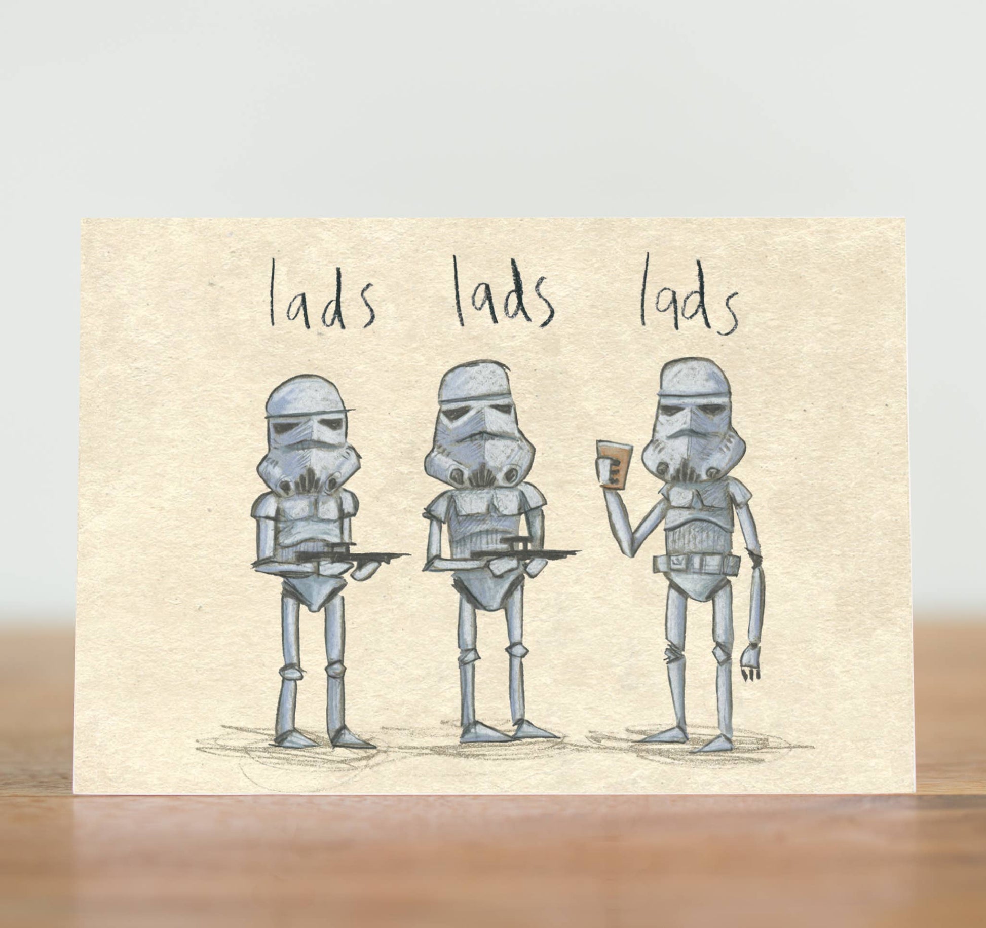 A great card for the mate who is a real trooper. The friend you can always rely on to be there for a lad's night out will appreciate this card. It’s perfect for birthdays or any other pint-worthy occasion!&nbsp;

We can’t use hyperdrive to get to another planet, so let’s look after this one. This laddish card is made from recycled paper and wrapped in fully biodegradable film.

Illustrated card, featuring three Stormtroopers on a lad’s night out