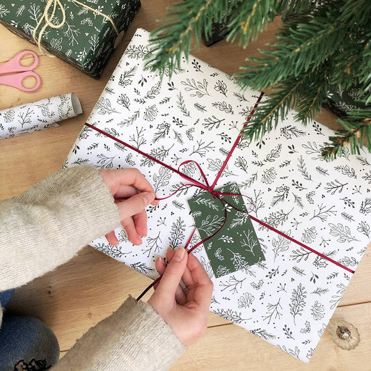 Festive Greenery White Wrapping Paper. Eco friendly and recyclable.