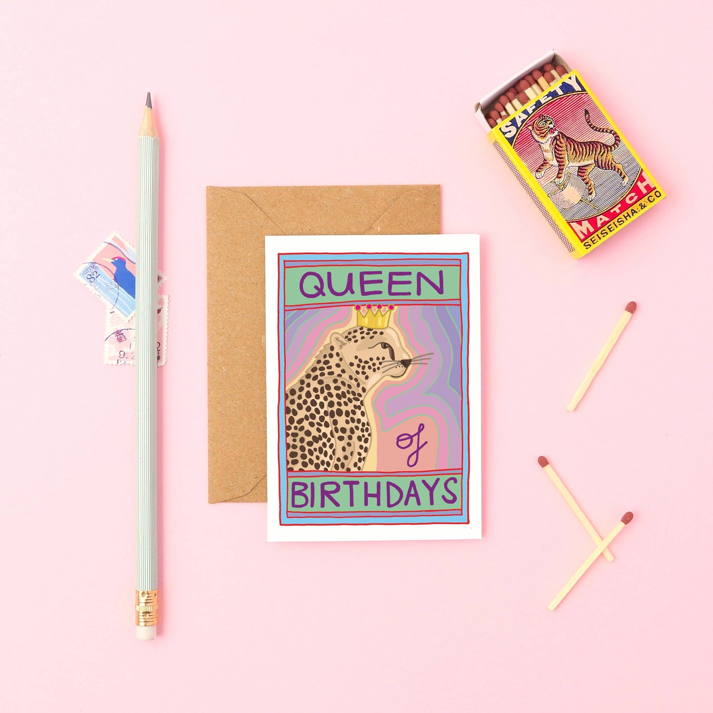 A7 Matchbox Mini Card. With the words QUEEN of BIRTHDAYS. Featuring a beautiful leopard in a golden crown.